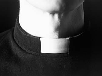 'Singing Priest' loses...